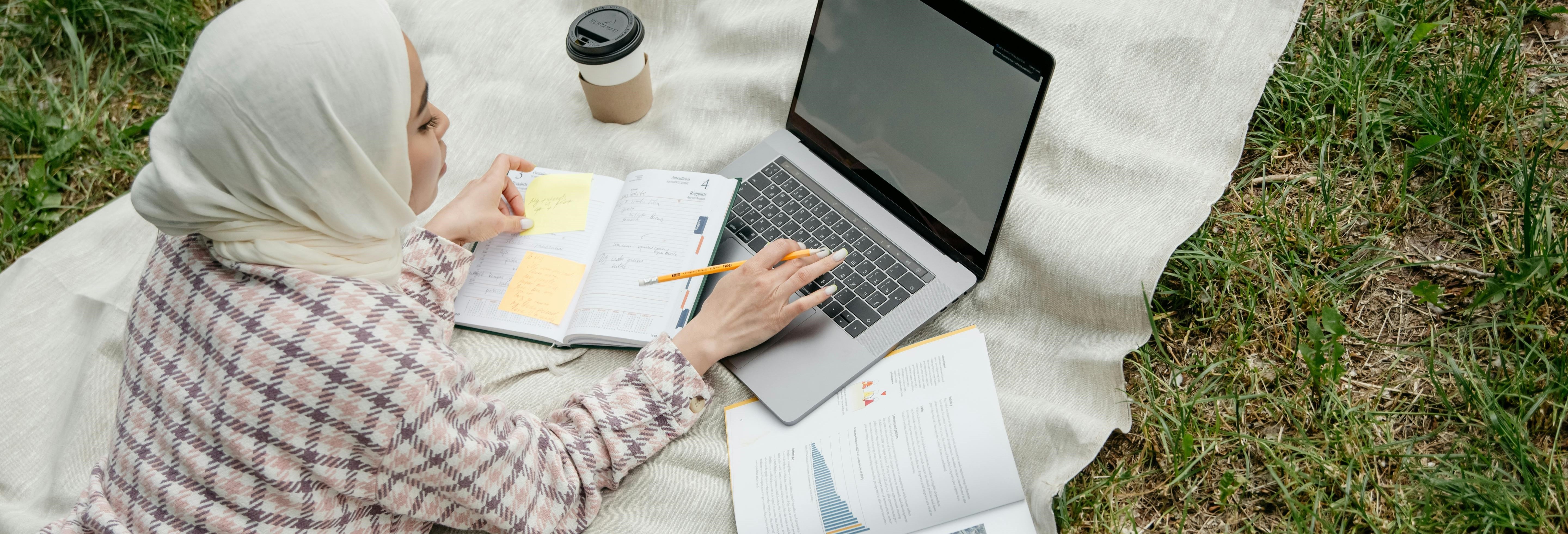 An open book showing a timeline of career achievements.